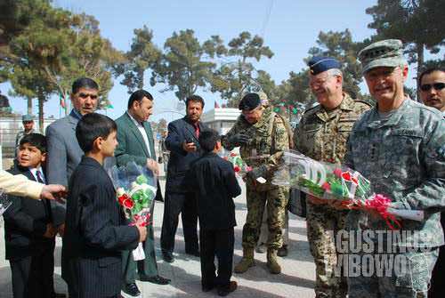 The NATO men arrive and the Mazar men welcome