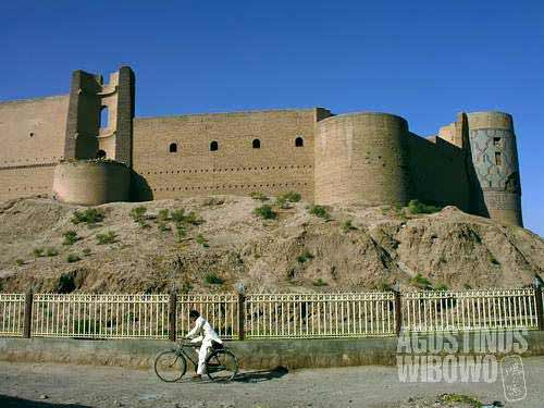 The Herat Citadel, known locally as Qala-ye-Ikhtiyaruddin, towers over the Old City of Herat, has foundations dating back as far as Alexander the Great. The present day fort was built by Shak Rukh in early 15th century.